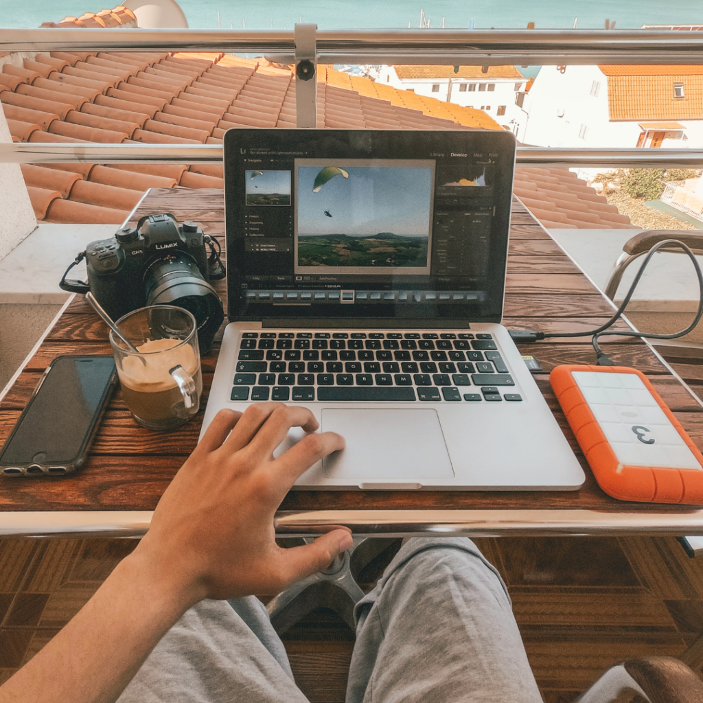 Laptop on desk outside working