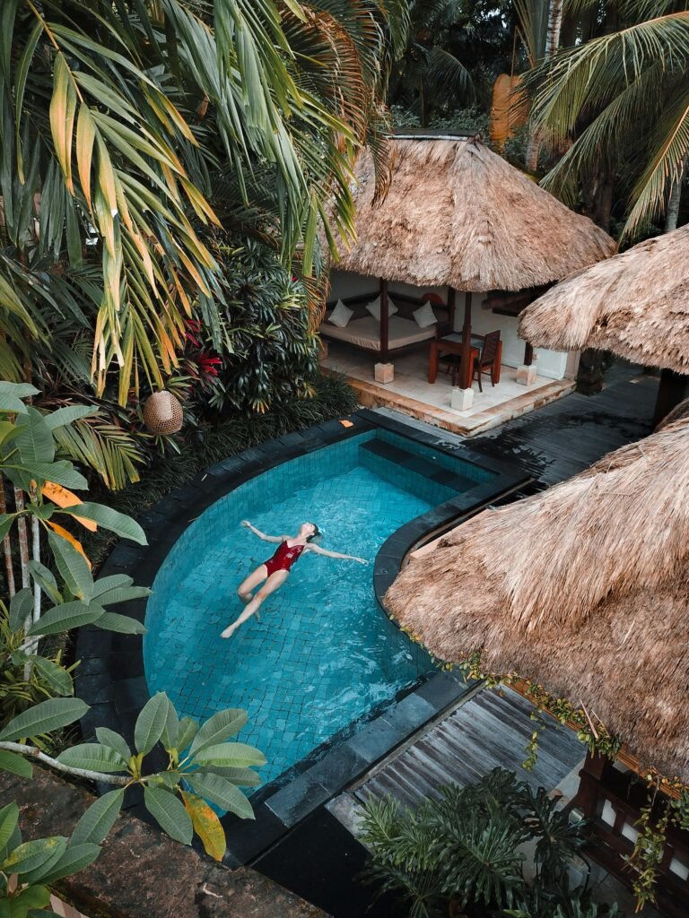 woman floating in the water in a tropical island