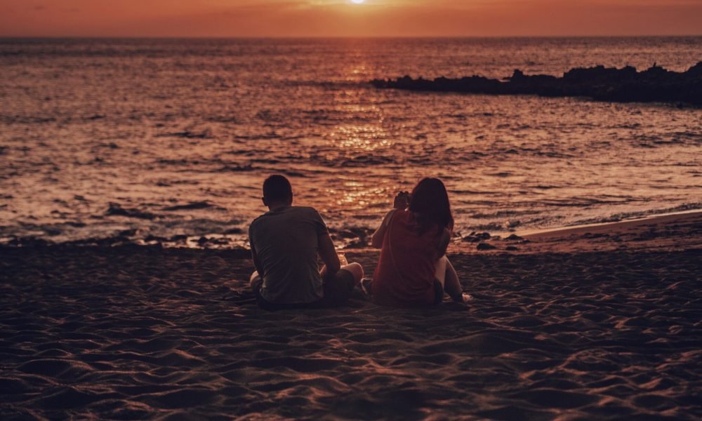 two-people-enjoying-the-beach-on-a-home-swap-in-tenerife